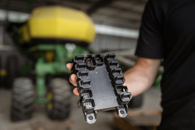 A person holding Precision Equipment
